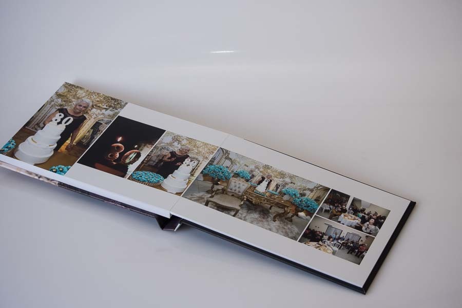 pagina com fotos com o bolo no album de aniversario de 80 anos da iracema Santo Andre SP album de fotos por Clovis Augusto com a marca Mundareu Albuns