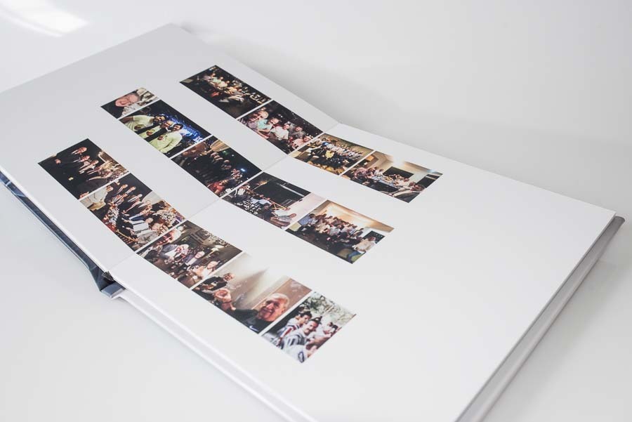 album aberto de aniversario Leonardo mostrando fotos da familia numa festa em duas paginas Campo Grande MT album de fotos por Clovis Augusto