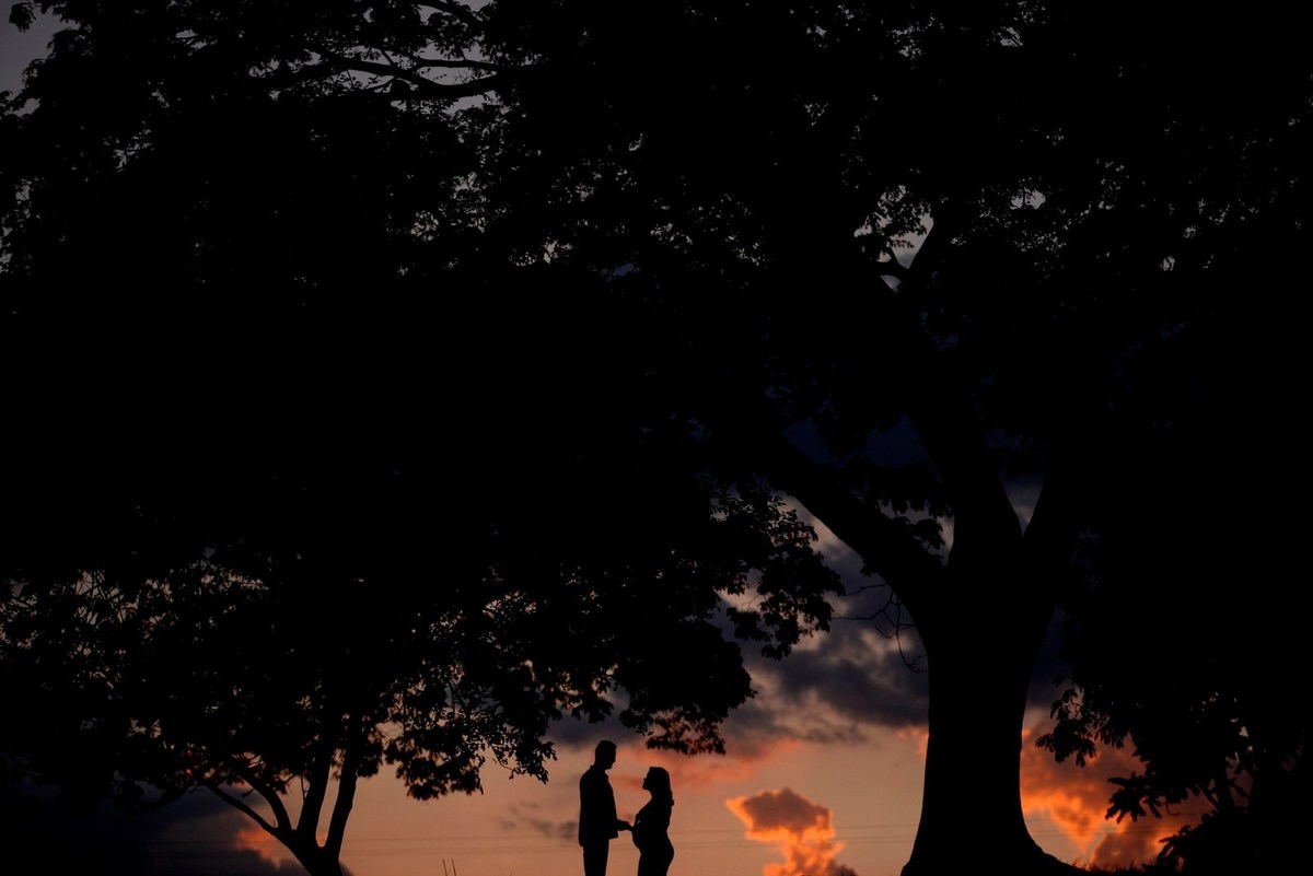 sessão de gestante com lindo por do sol. fotografia de andré monteiro 