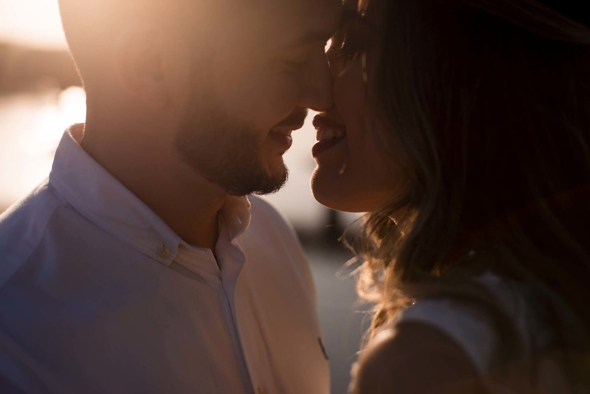 fotografia de casal com lindo por do sol