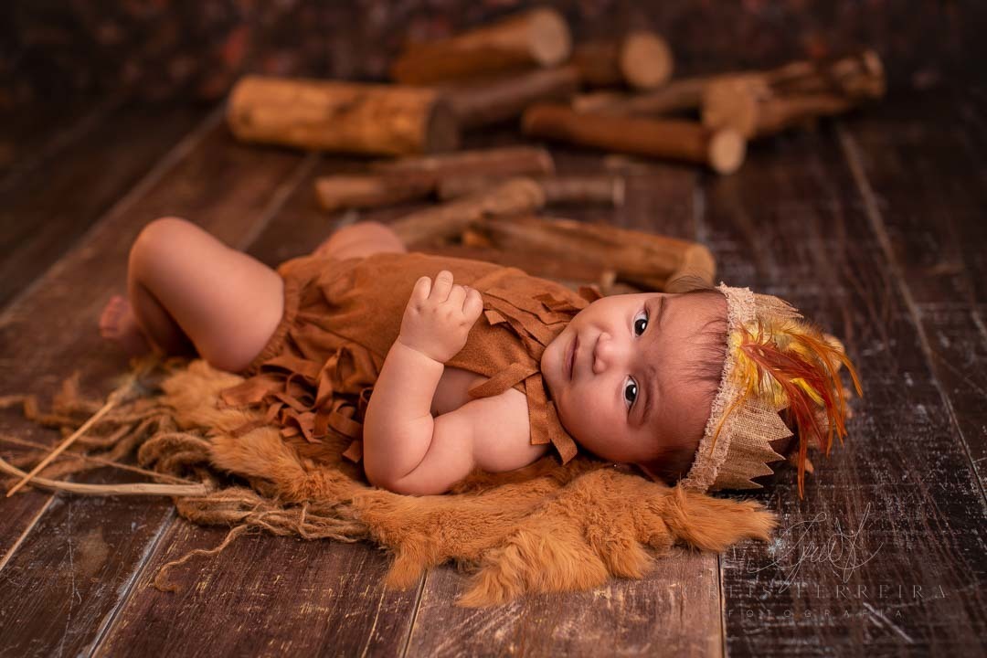 ensaio de bebe 5 meses indio arco flecha