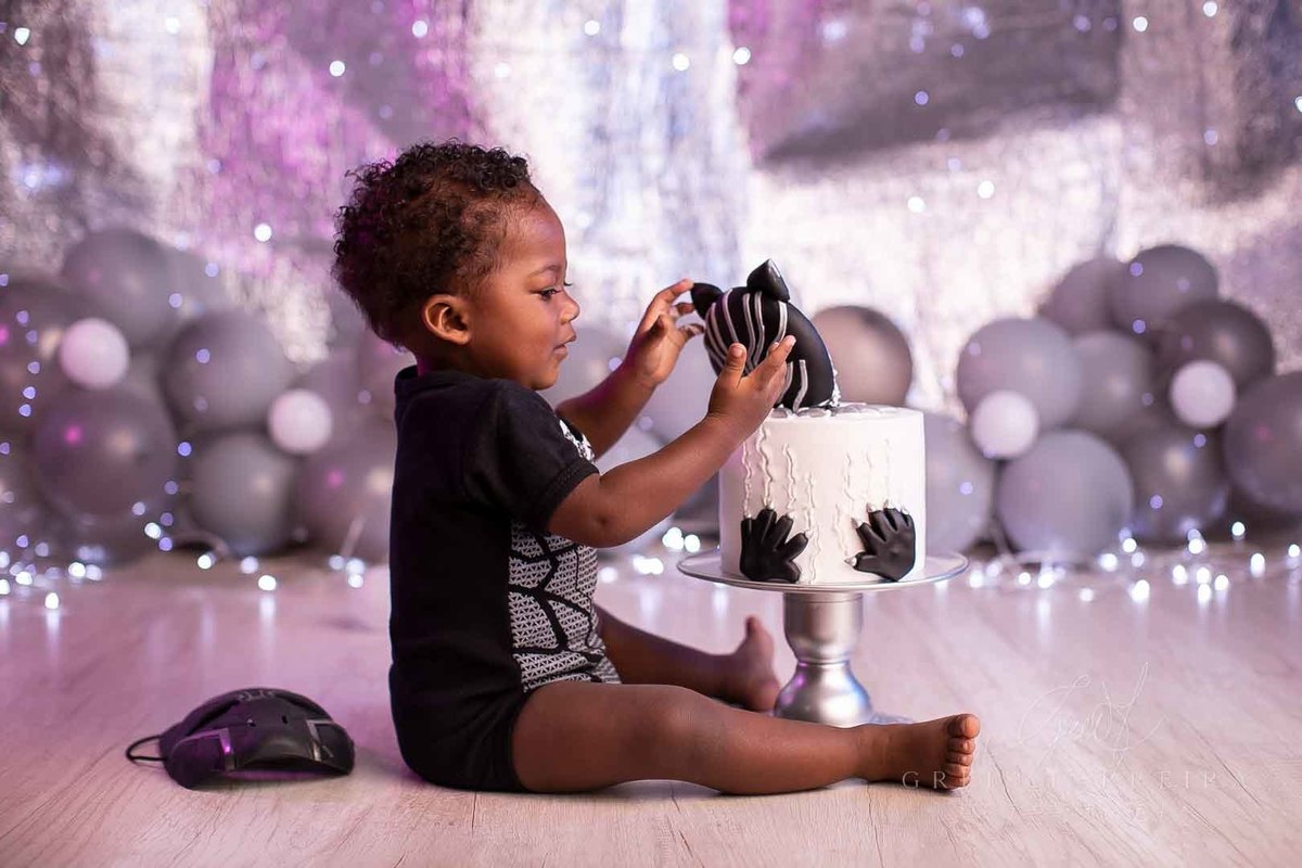 smash the cake pantera negra bebe preto olhos azuis