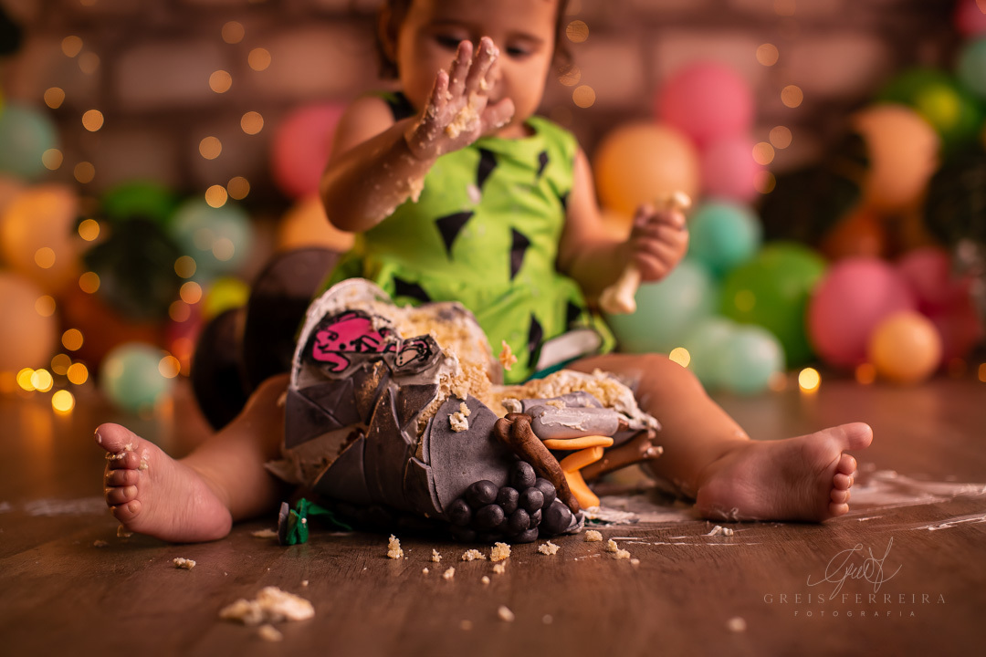 smash the cake da pedrita flintstones ensaio de aniversario de bebe de 1 ano
