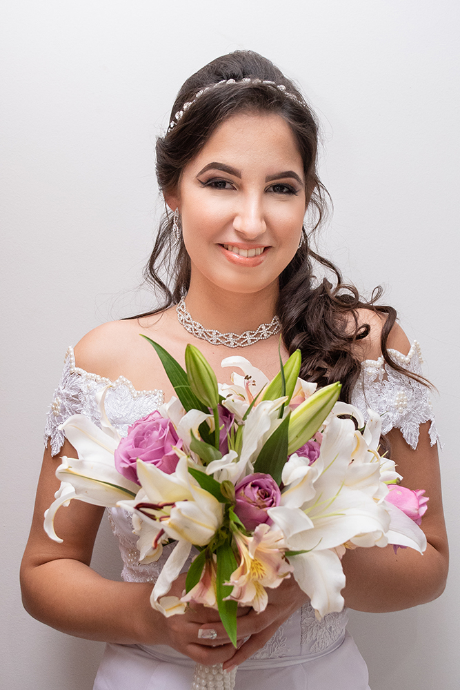 noiva segurando buque