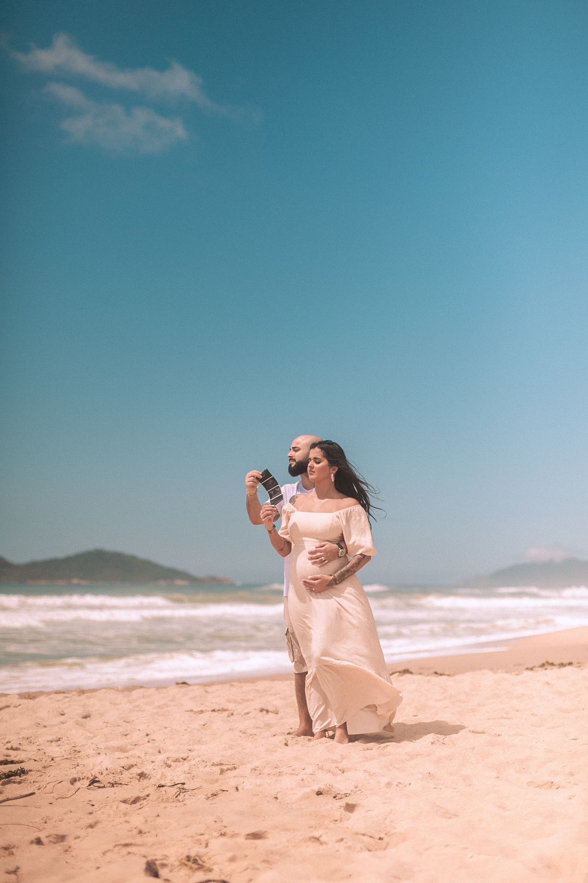 Ensaio na praia_revelação do bebê