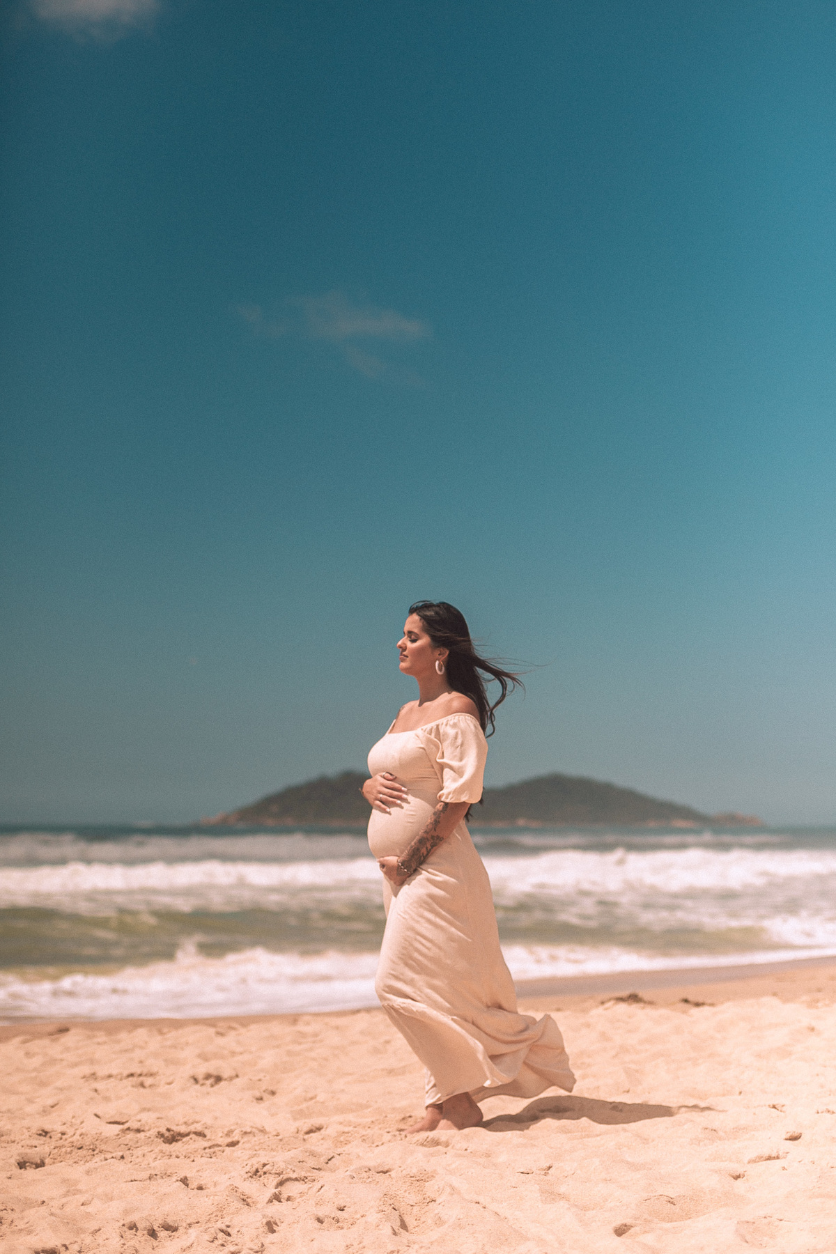Ensaio na praia_revelação do bebê