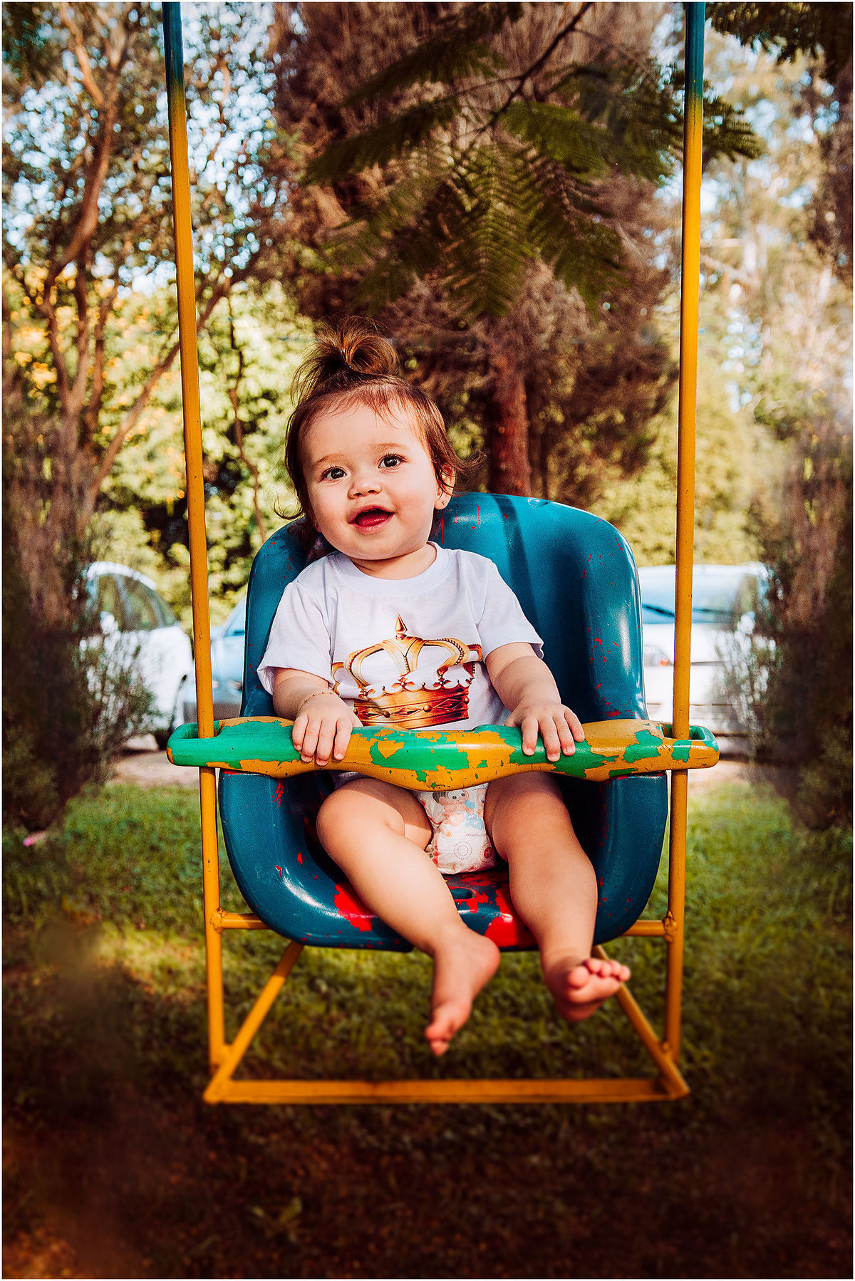 ensaio infantil, criança no balanço