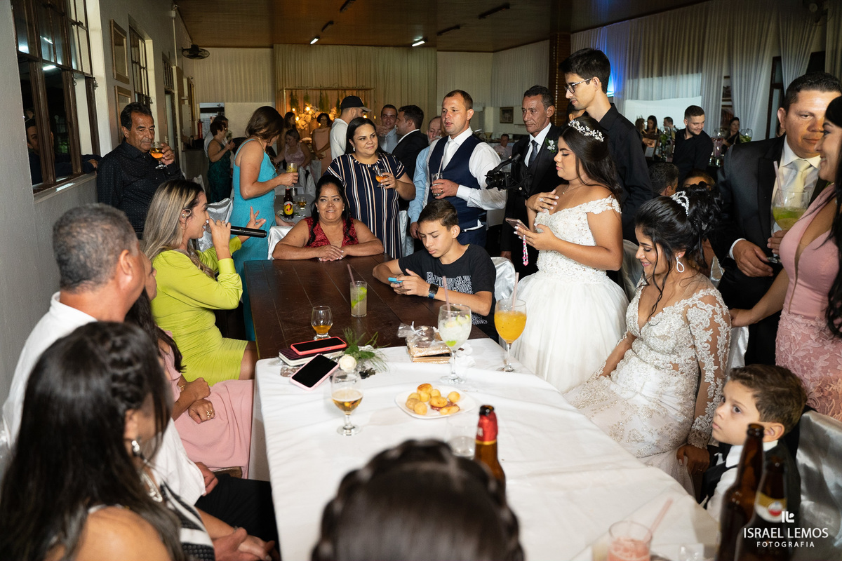 recepção no varandão em pitangui com o fotografo de casamento da cidade de pintalgai israel lemos