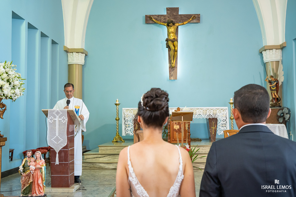 Fotografia de casamento na igreja N. S. da saude na cidade de perdigão 