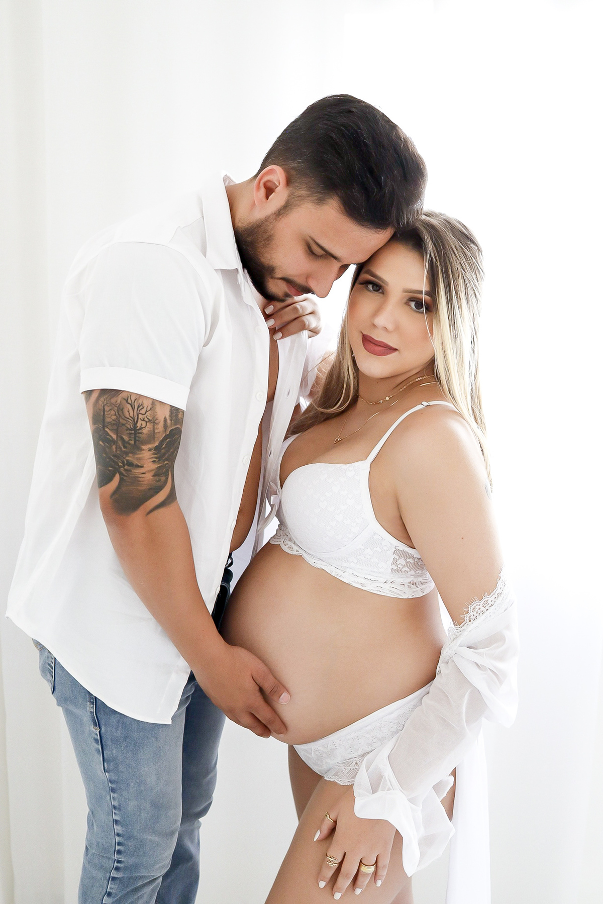 Ensaio gestante e esposo.