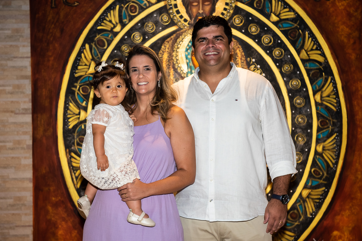 Linda foto da família preparando para o batizado