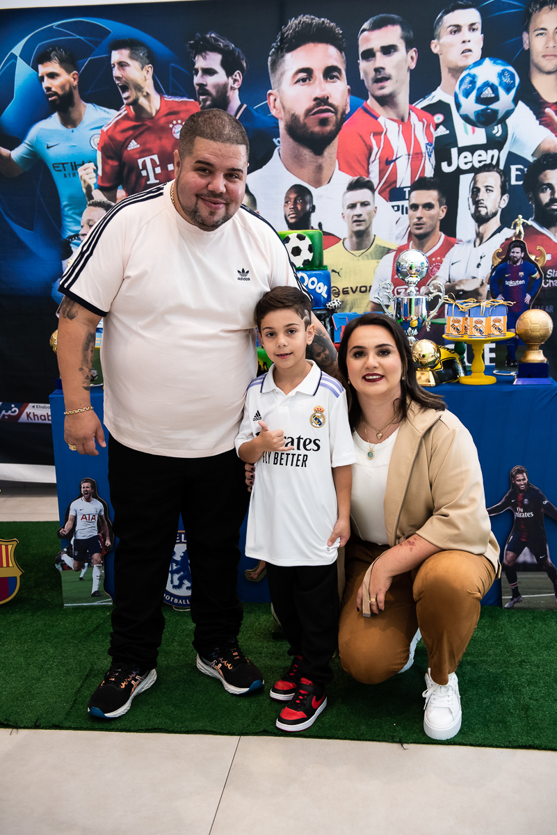 Papai, Gui e mamãe abaixada para a fotografia