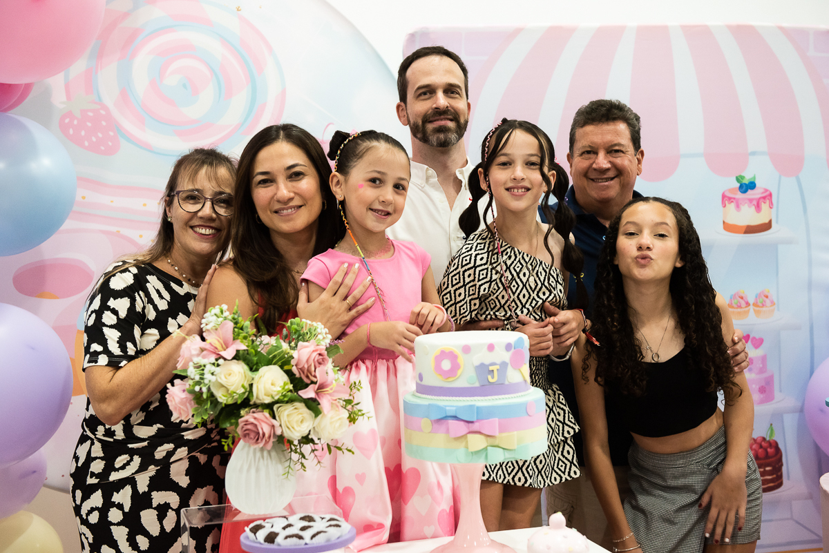 foto da família com os tios e priminha