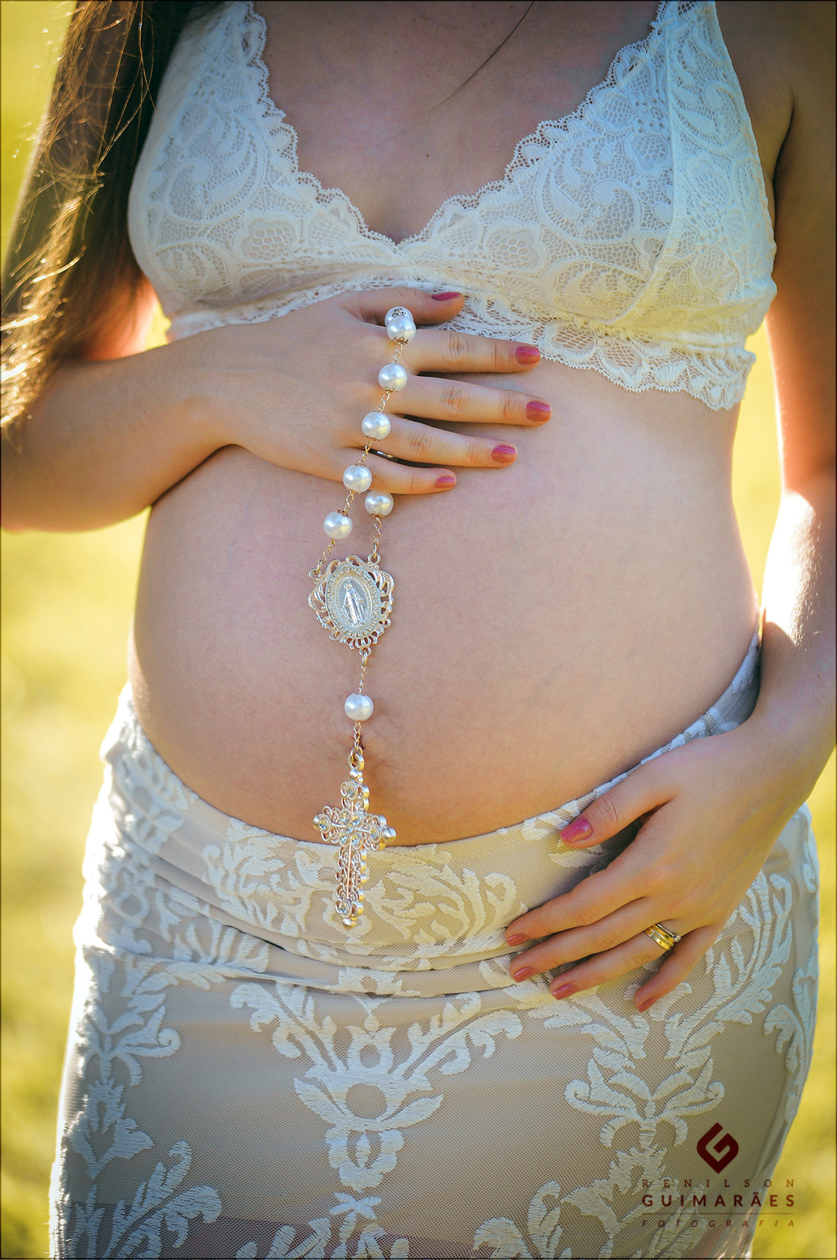 Gestante com o rosário