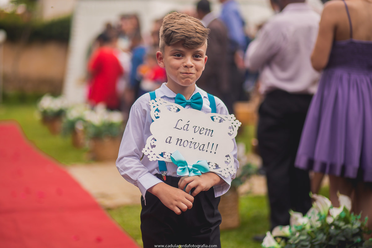 Pajem com a plaquinha 