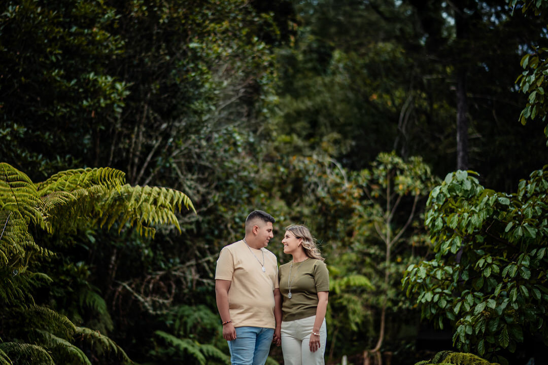 Pre-wedding photography session of the couple in a natural setting.