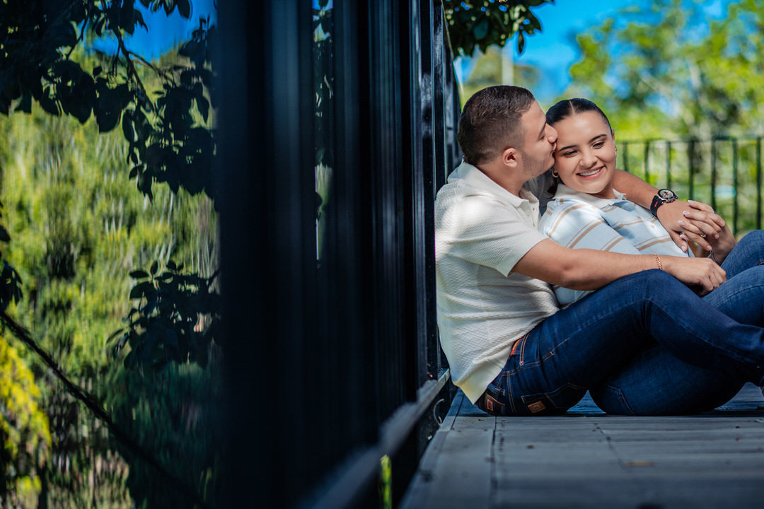 Pre-wedding photography session of the couple in a natural setting.