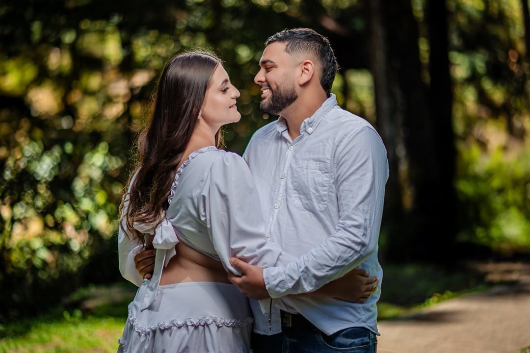 Pre-wedding photography session of the couple in a natural setting.